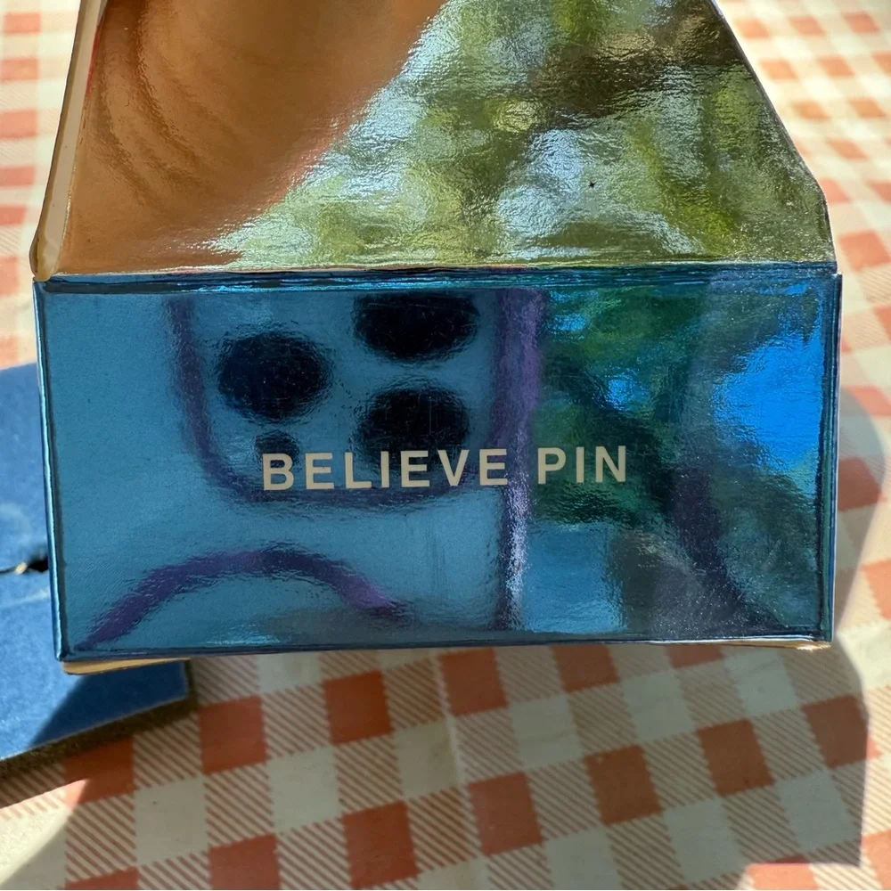 Avon Goldtone “Believe” pin NIB vintage 2007